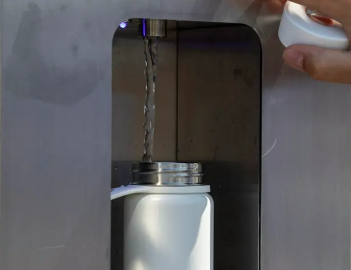 Girl drinking cold filtered water